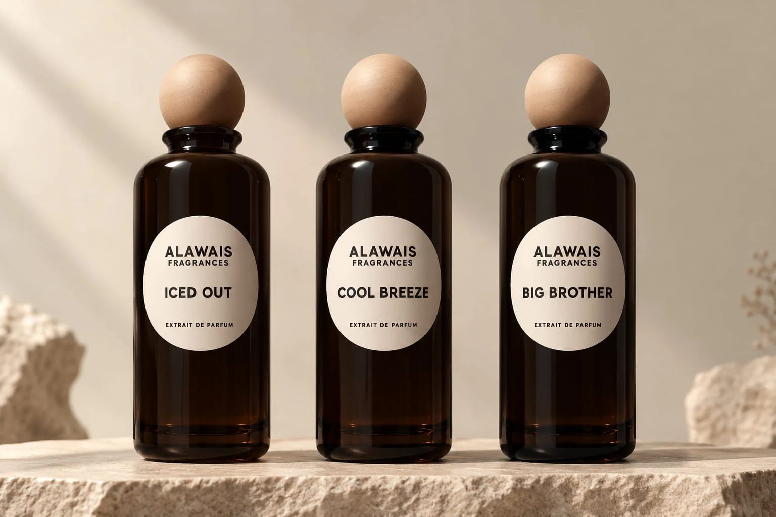Alawais Iced Out, Cool Breeze and Big Brother extrait de parfum bottles on stone